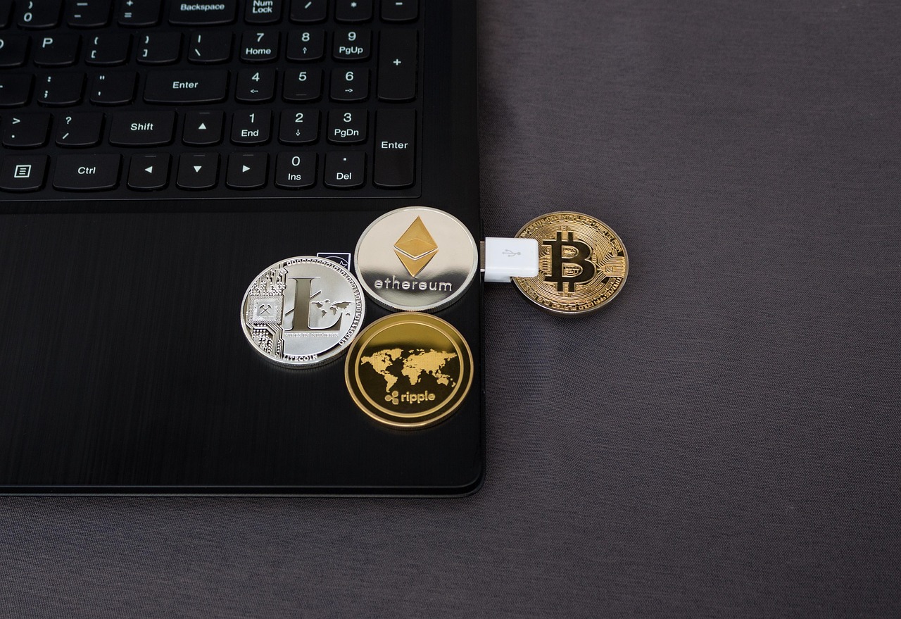 Crypto coins and laptop