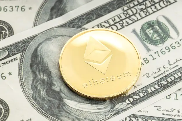 Ethereum coin placed on top of U.S. one hundred dollar bills.