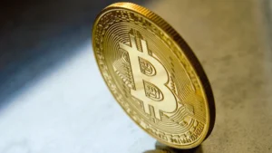 Bitcoin rebounds to $82,593 after a brief dip below $82,000, but ETF outflows and yields put $80,000 support at risk.